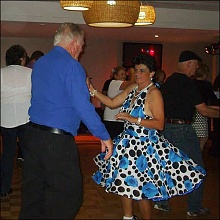 Colleen spin dancing in the blue hibiscus halter!