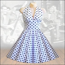 A classic white with black polka dot is a dress to please with compliments and head turning with every flaring tease!